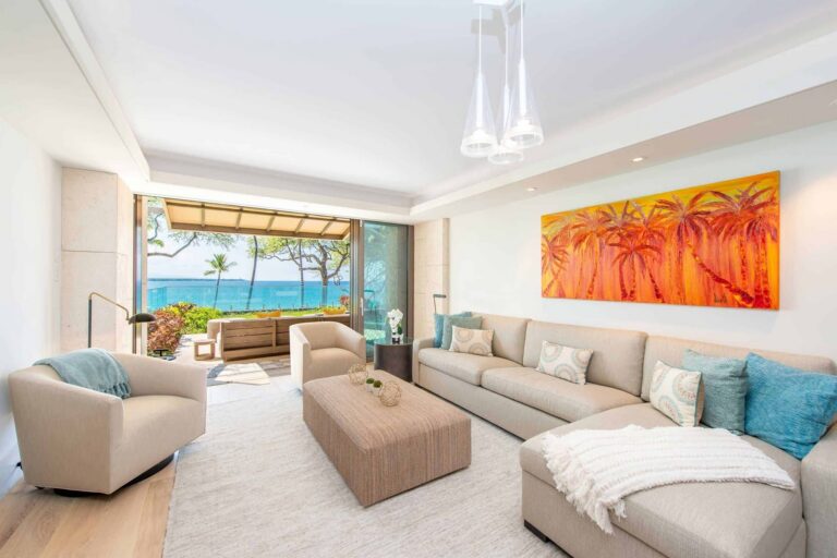 A bright living room showcasing a stunning ocean view, adding a touch of tranquility to the space.